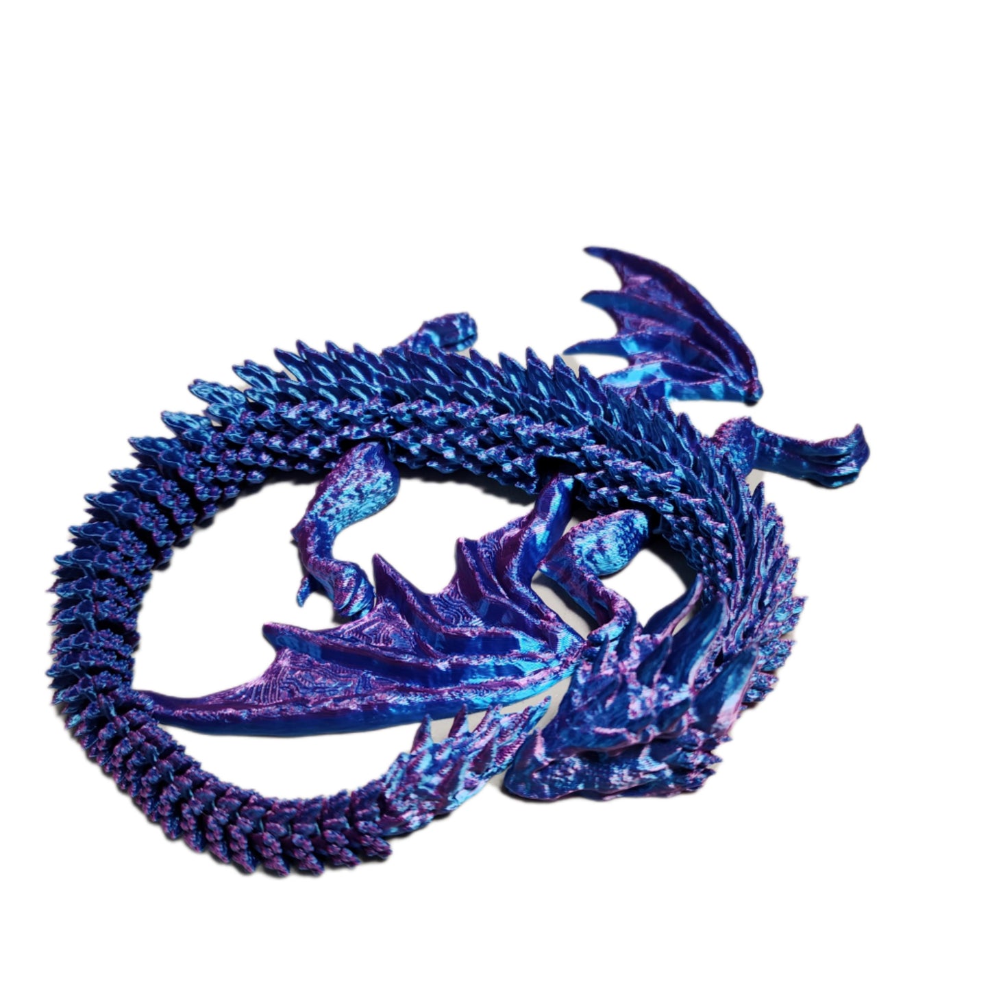 3D printed articulating winged Dragon. 14 inches long! 8 inches wide. 1 inch high.