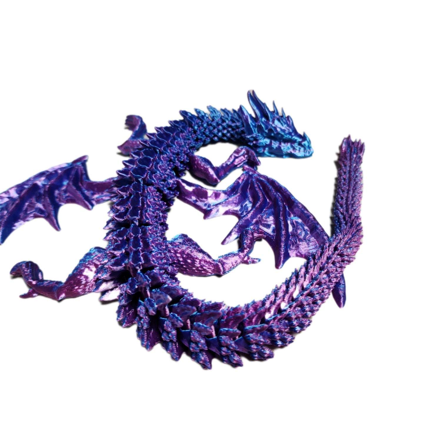 3D printed articulating winged Dragon. 14 inches long! 8 inches wide. 1 inch high.